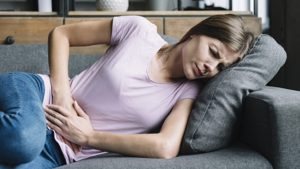 Woman in pains from endometriosis 